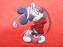 Disney golfpolo met Minnie Mouse opdruk geborduurd._